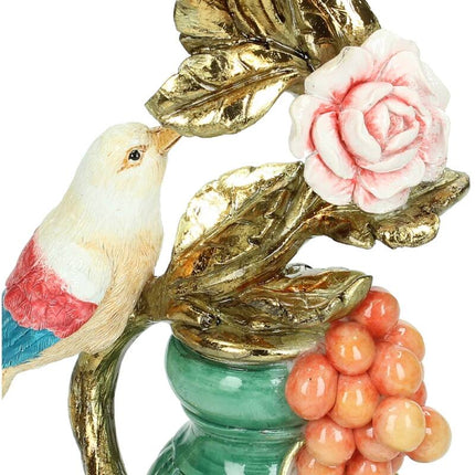 Add a splash of color to your decor with the Hummingbird Multi candle holder. Its vibrant, detailed design brings life to any space, making it a delightful addition indoors or out.  Size: 11 x 29 cm