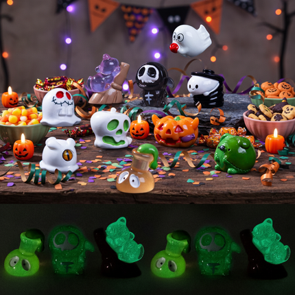 Ten small Halloween figurines in various colours, including ghosts and pumpkins, that glow in the dark